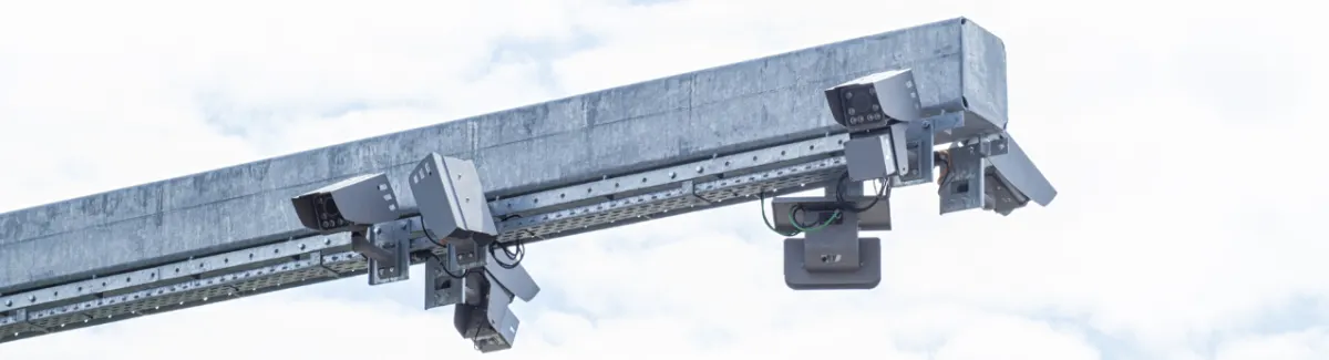Toll gantry with road toll system cameras